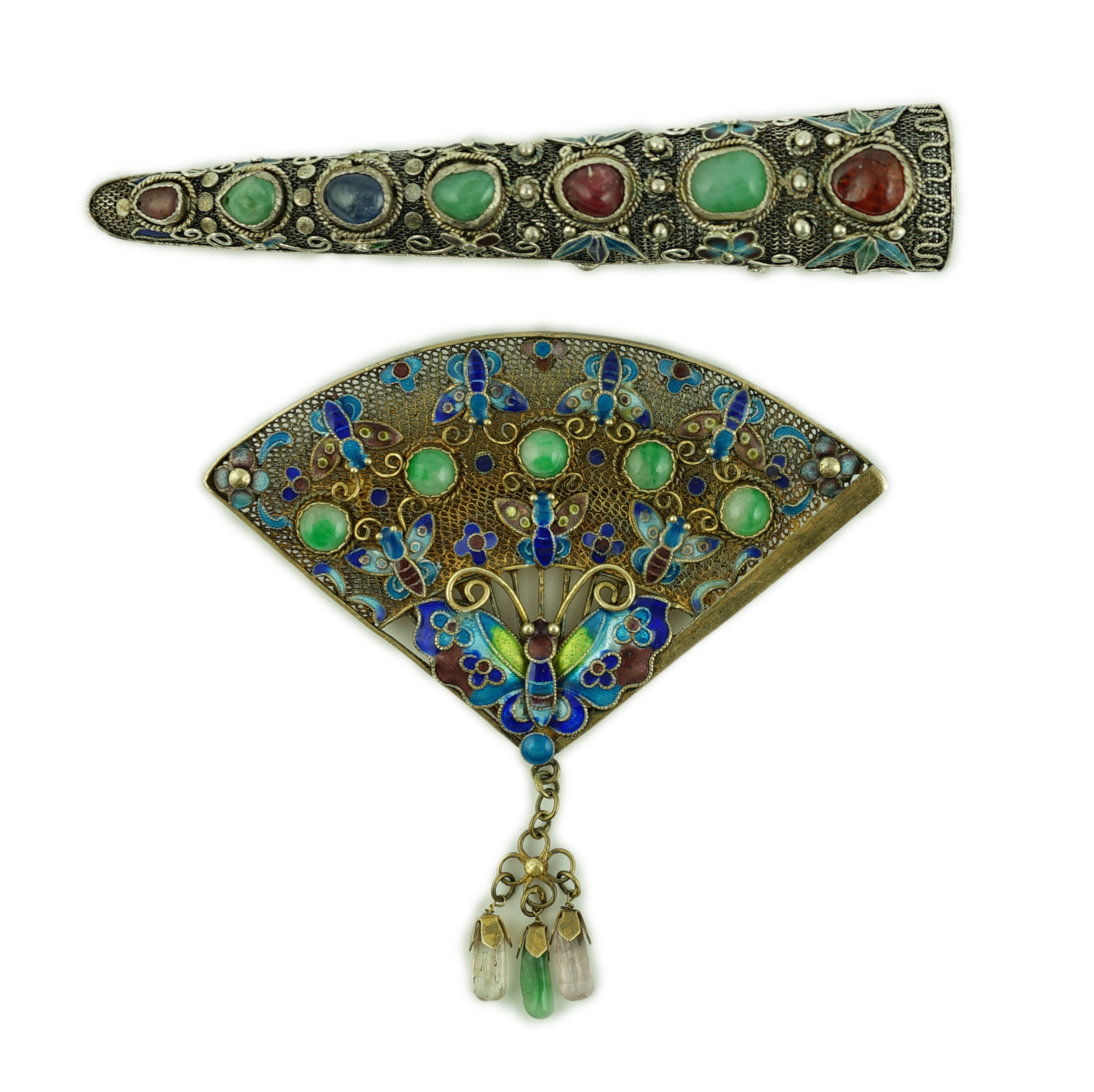 A Chinese silver, enamel and jadeite 'fan' brooch, width 69mm and a similar nail guard brooch, 87mm